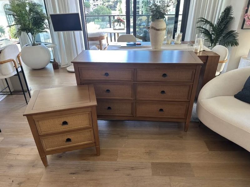 Wood six-drawer dresser with woven drawer fronts and a matching two-drawer nightstand